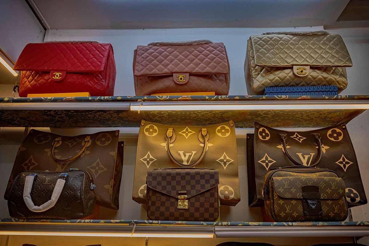 Imitations of Chanel and Louis Vuitton bags imported from China are seen for sale at a mall on April 23, 2025 in Manila, Philippines.  (Getty Images/Ezra Acayan)