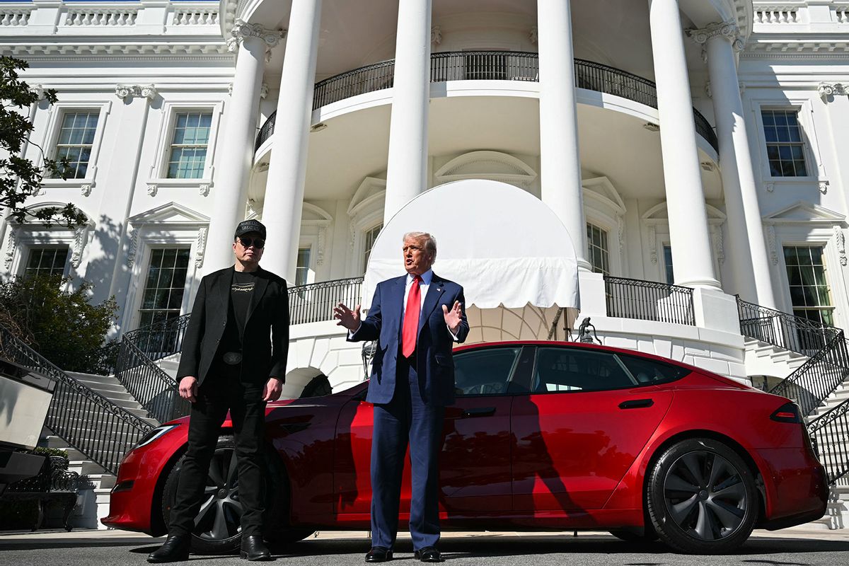 President Donald Trump and Tesla CEO Elon Musk speak to the press as they stand next to a Tesla vehicle on the South Portico of the White House on March 11, 2025 in Washington. (Mandel Ngan / AFP via Getty Images)
